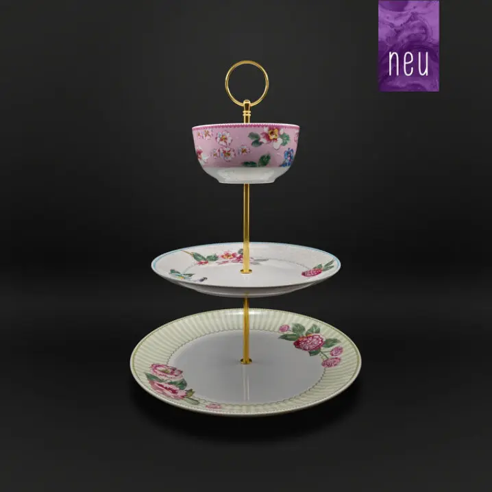 Stilvolle 3‑stufige Etagere aus Porzellan mit Blumen-Dekor und goldfarbenem Griff – ideal zum Servieren von Gebäck, Obst oder Snacks.